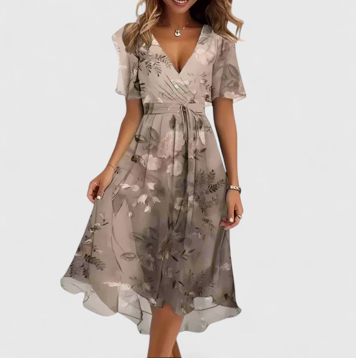 Chic women's floral flutter sleeve midi dress, a versatile v-neck design perfect for elegant casual summer wear.
