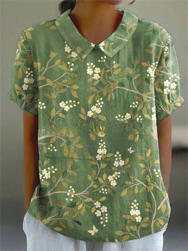 Comfortable women's floral print collared blouse, short sleeve, perfect for relaxed casual summer outfits.