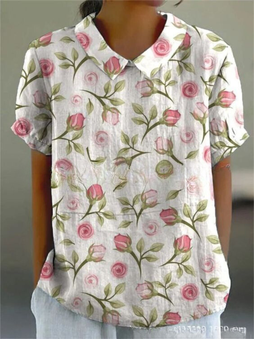 Women's elegant floral print collared short sleeve blouse. Ideal for stylish everyday fashion & summer casual wear.