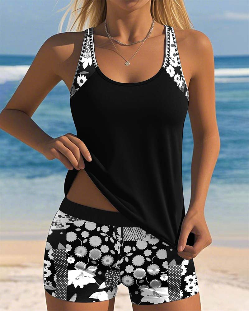 Stylish women's floral print tankini with racerback top & boyshorts. Trendy summer fashion beachwear.