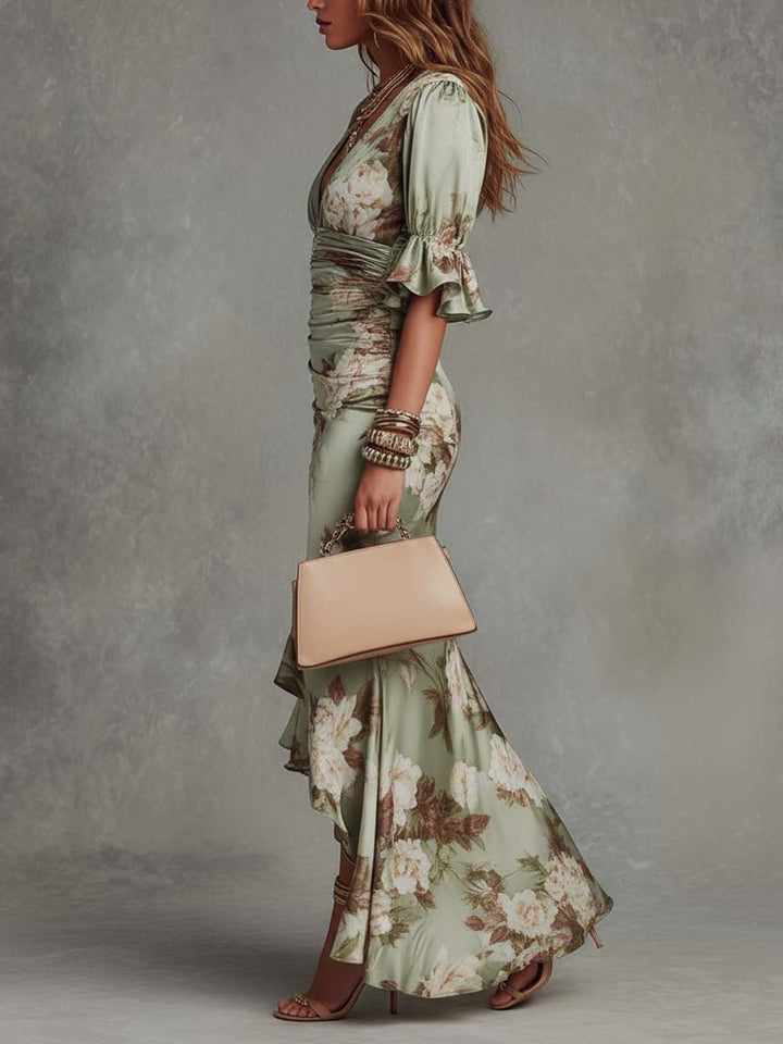 Elegant women's v-neck floral maxi dress with frill sleeves & ruched fishtail, ideal for wedding guests.