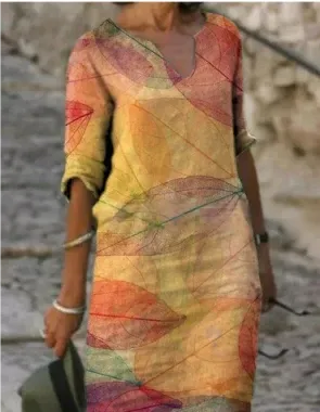 Women's summer V-neck midi dress with a unique floral artistic print, perfect for any occasion.