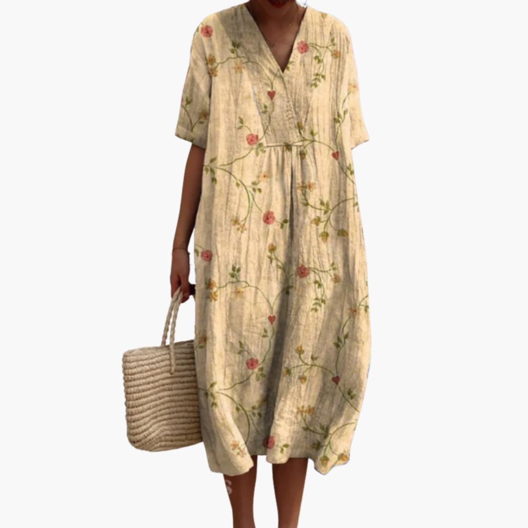 Lightweight floral V-neck midi dress. Women's oversized, short sleeve, perfect for travel & casual wear.