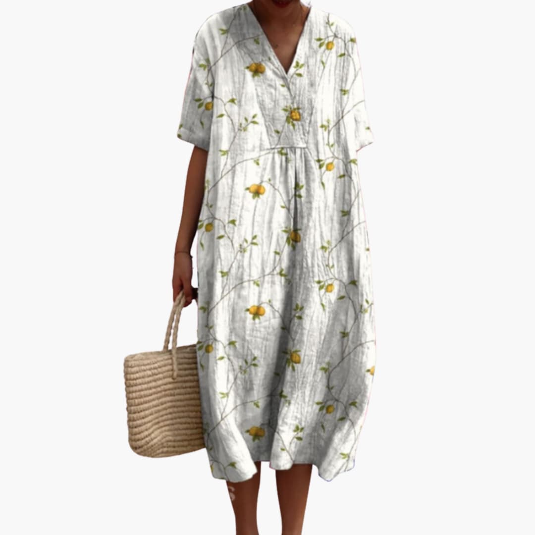 Versatile floral V-neck midi dress. Women's oversized, relaxed fit, great for summer, travel & casual fashion.