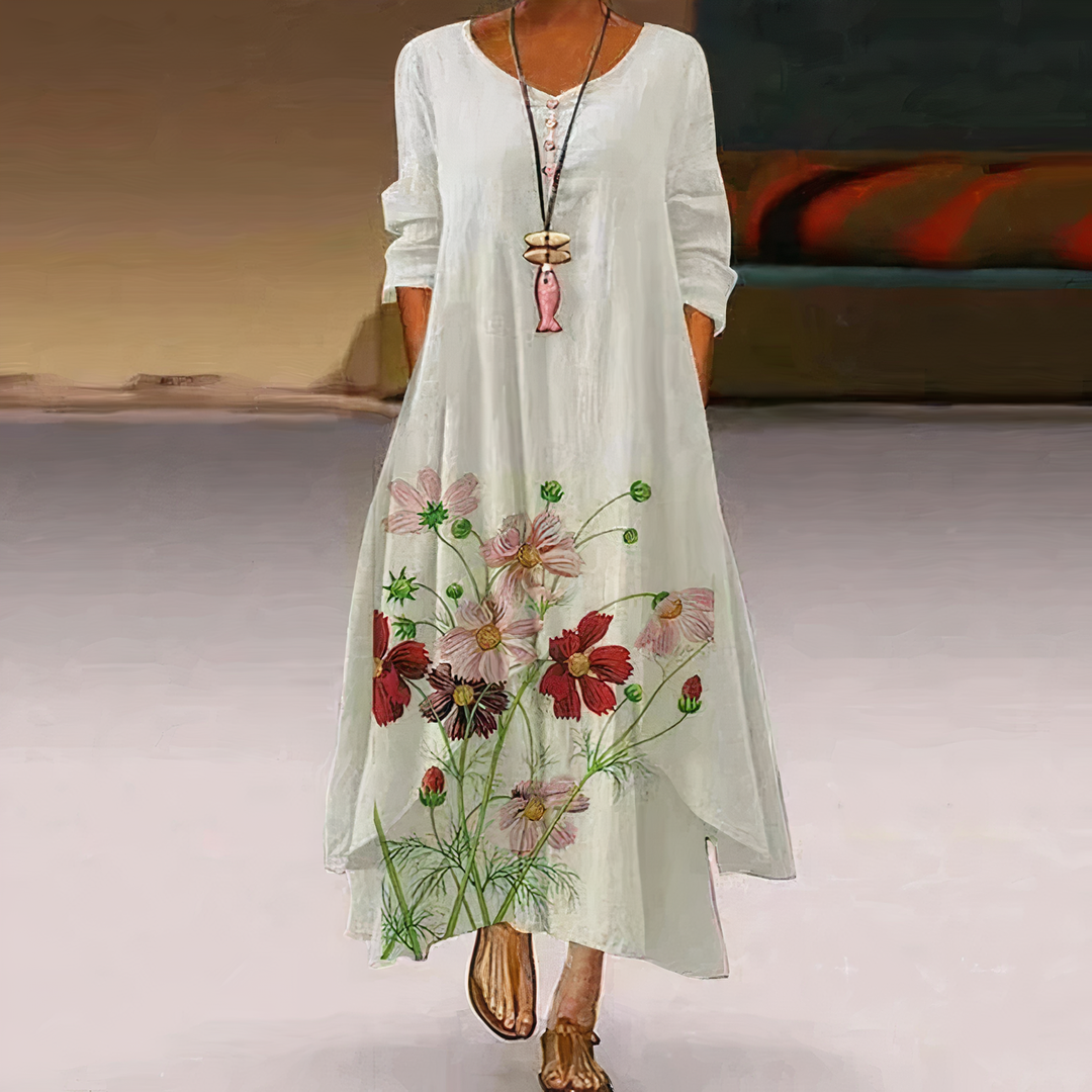 Women's flowing long-sleeve midi dress with vibrant graphic print & stylish asymmetric hem.