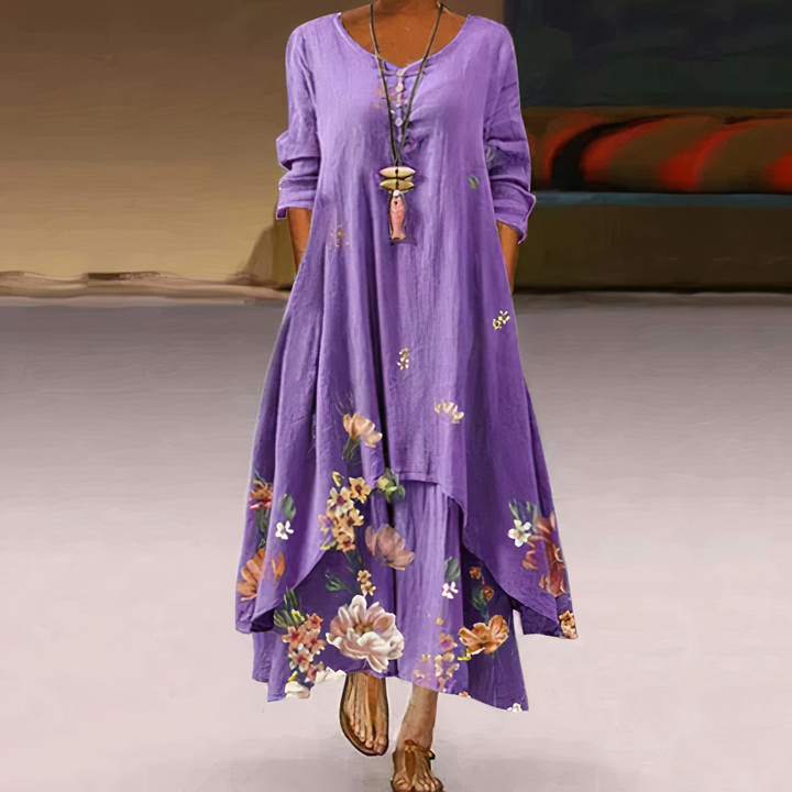 Casual women's flowy long-sleeve dress, eye-catching graphic print & chic asymmetric hem.