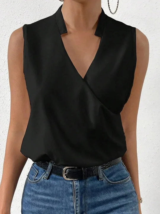 Relaxed fit V-neck top, a stylish women's blouse perfect for summer fashion. Lightweight & comfortable casual wear.