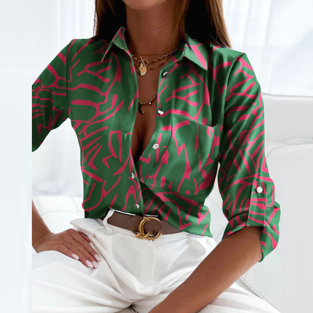 Women's fashion blouse, geometric print, button-down, a chic and elegant piece.