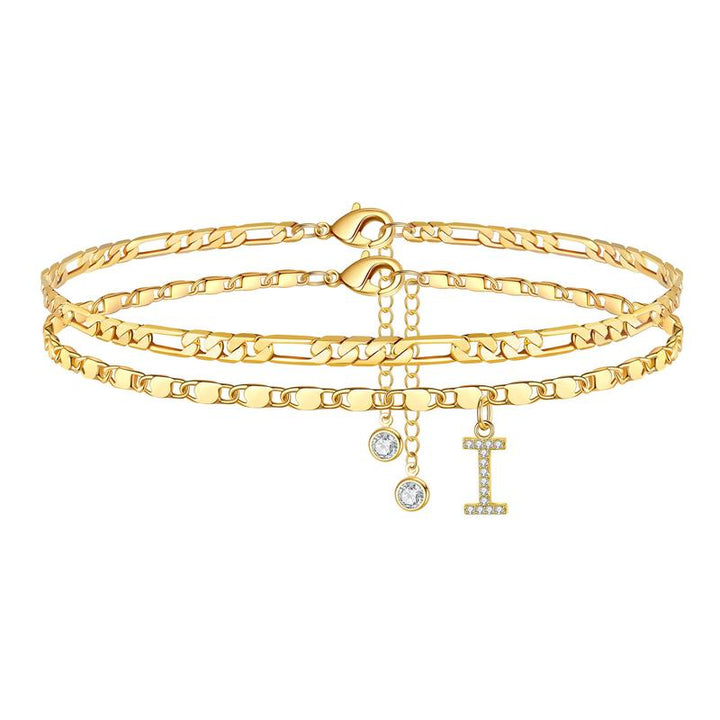 Gold plated women's anklet displaying 'F' initial and a small crystal, ideal initial jewelry