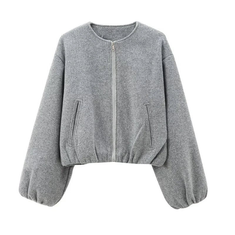 Women's grey cropped zip-up sweater made of polyester, perfect for fall casual wear.