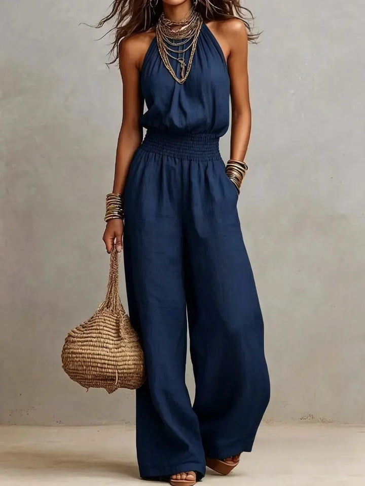 Chic women's halter neck wide leg jumpsuit, a versatile and stylish choice for summer, resort, or everyday elegance.
