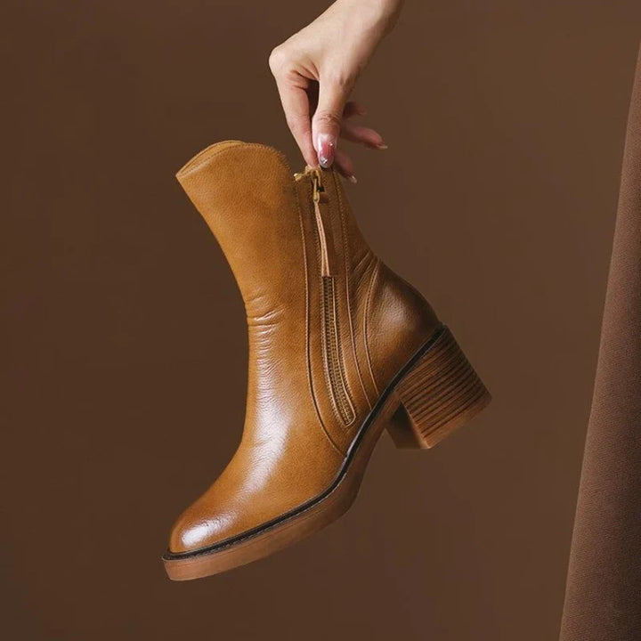 Stylish women's high heel ankle boots, shock absorbing sole for comfortable formal party footwear.
