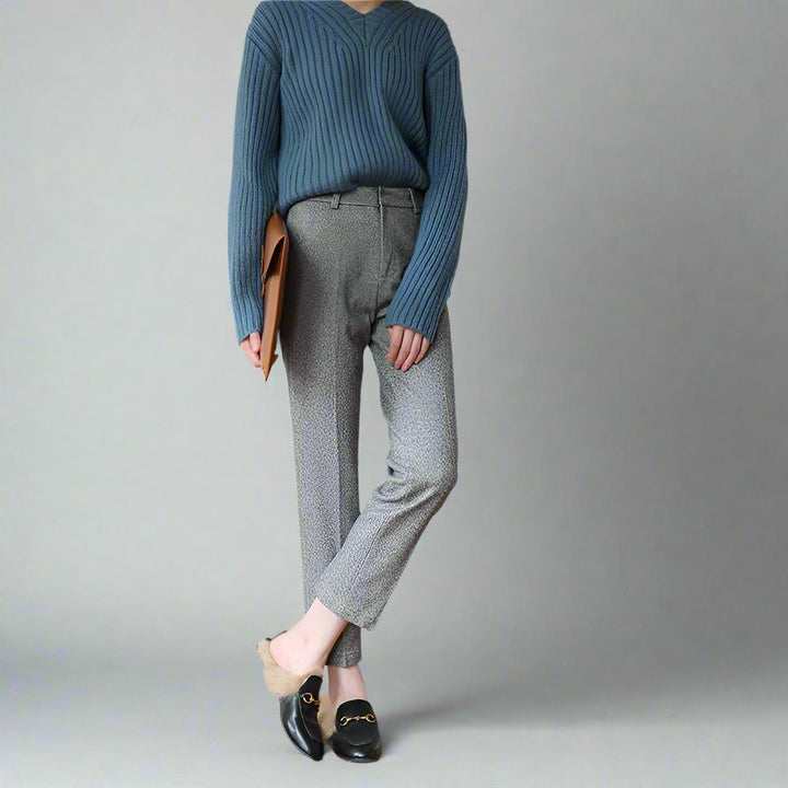 Back view of gray high-waist wool blend straight leg trousers, showing pockets and fit