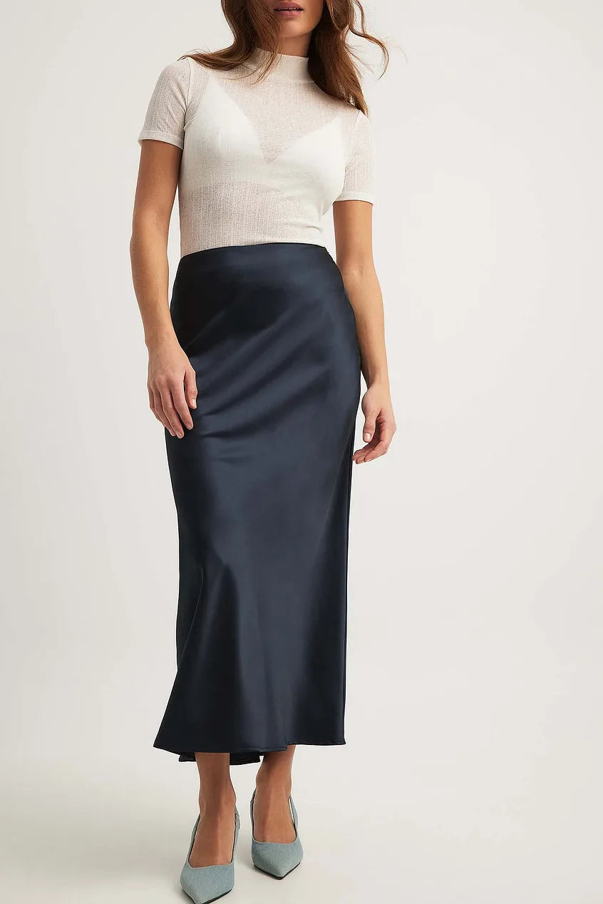 Sophisticated women's high-waist satin midi skirt, with a graceful flowing silhouette.