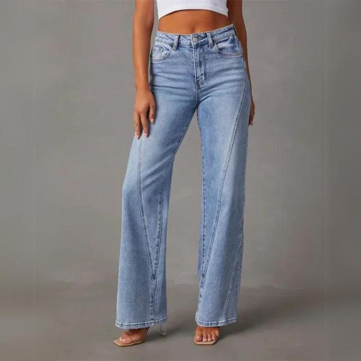 Women's high-waist wide-leg denim jeans in a classic blue wash, perfect for casual spring fashion.