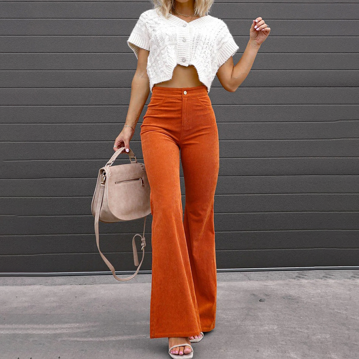 Versatile women's flared pants, high-waisted ribbed design, embodying retro style & comfort.