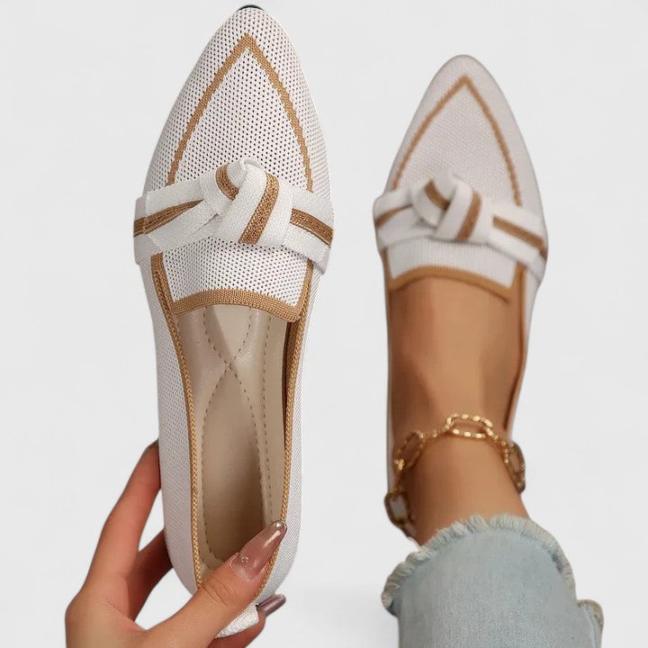 Women's knot-front pointed-toe flat loafers in black, perfect for chic everyday wear or dressy casual outfits.