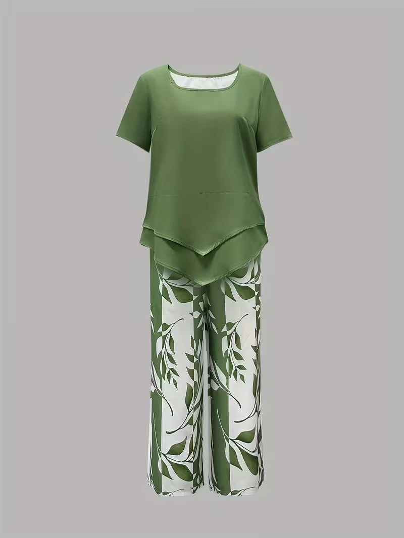 Stylish women's botanical leaf print two-piece outfit. Short sleeve top and relaxed fit pants set.