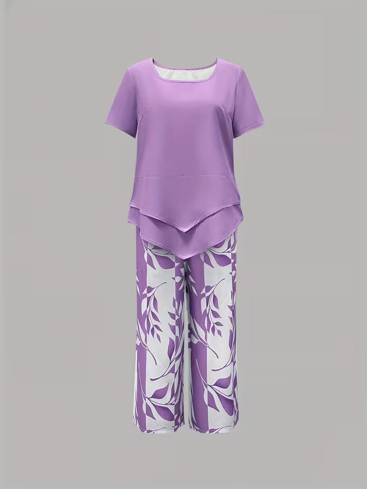 Versatile women's two-piece leaf print outfit. Casual elegance for summer, short sleeve top & pants matching set.