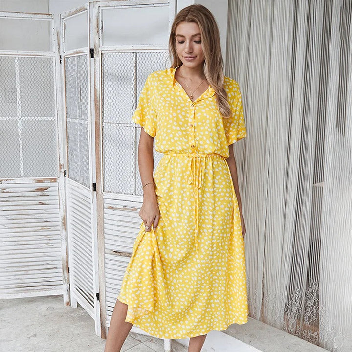 Trendy women's leopard print shirt dress, a belted midi style, excellent for day or vacation wear.