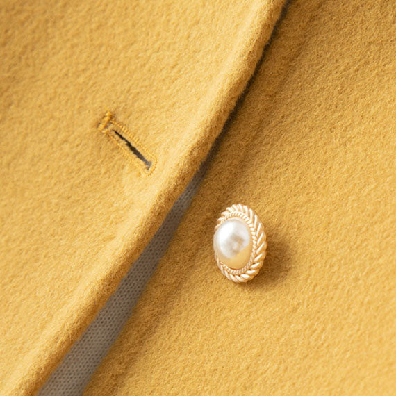 Elegant women's cashmere knit jacket with button-front, perfect for a chic casual look