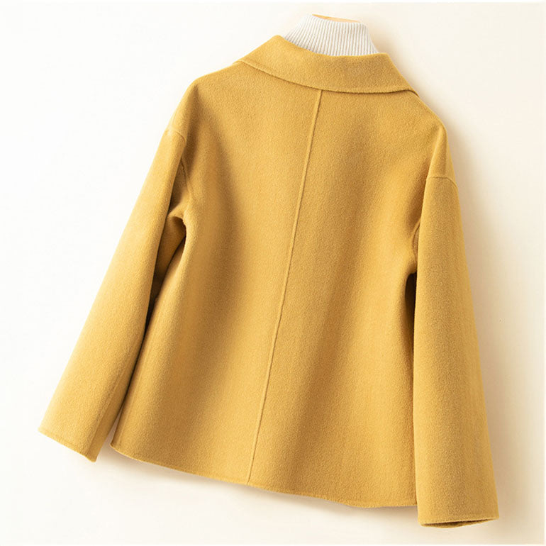 Soft cashmere knit women's jacket, lightweight and luxurious, with button details and cozy feel