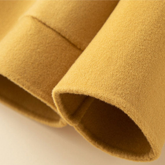 Side view of women's cashmere knit button jacket, versatile and elegant for everyday wear