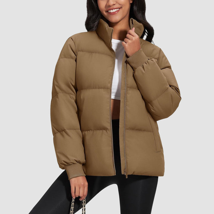 Model posing in a black lightweight quilted down jacket, comfortable and fashionable