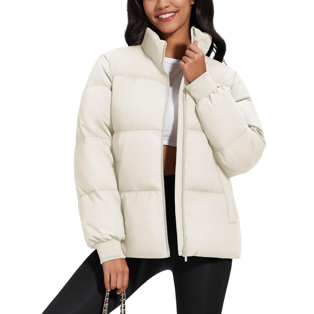 Black women's puffer jacket, open, revealing inner lining, lightweight and versatile