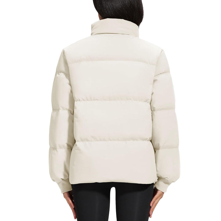 Mannequin displaying a black women's lightweight quilted puffer jacket, versatile style