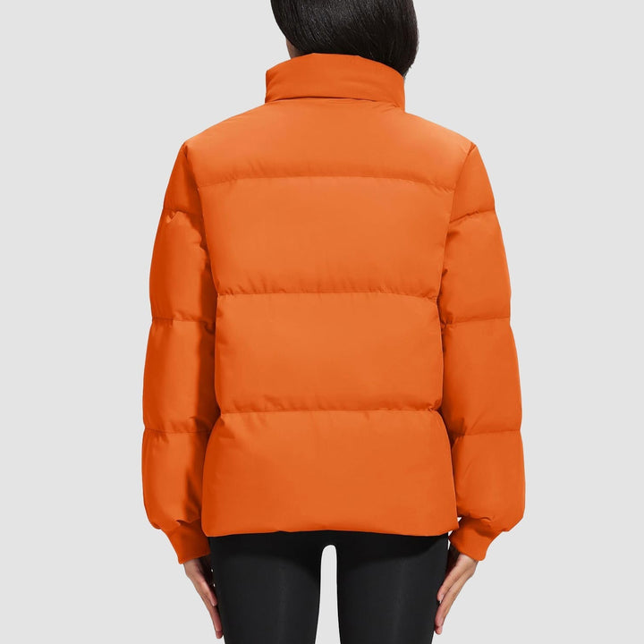 Black women's quilted parka, a longer version of the lightweight puffer jacket, warm