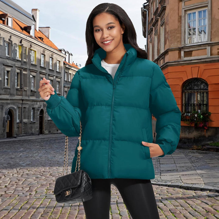 Full length view of a black women's lightweight quilted jacket, sleek and elegant