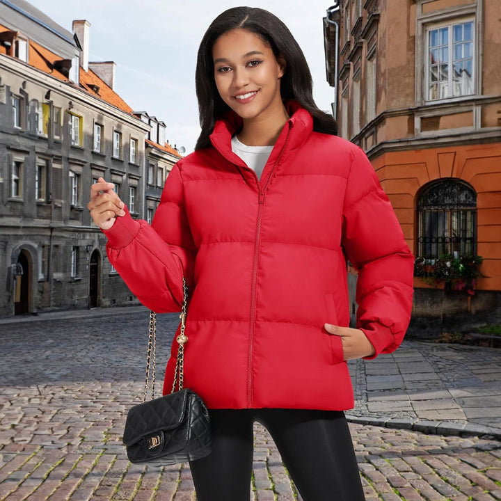 Black women's puffer jacket on a hanger at home, casual and accessible for daily use