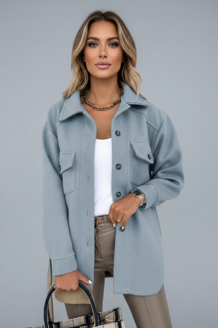 Pink women's collared shacket. Longline button-front jacket for a soft, casual spring/fall look.