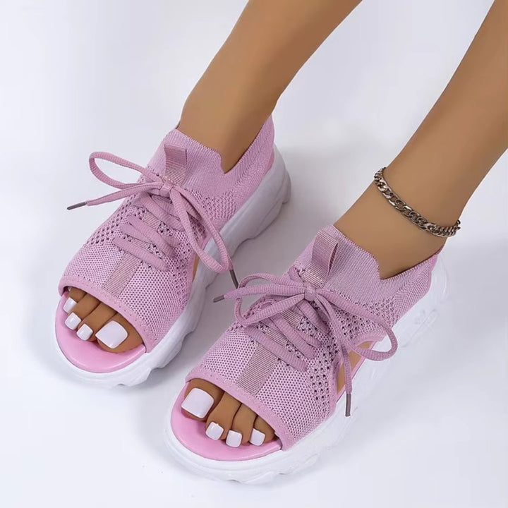 Comfortable women's open-toe platform sandals. Lace-up closure ensures an adjustable fit for all-day wear.