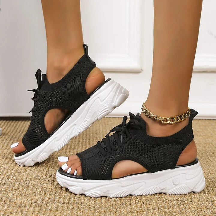 Women's open-toe platform sandals with elegant lace-up details. Chic summer shoes for any outfit.