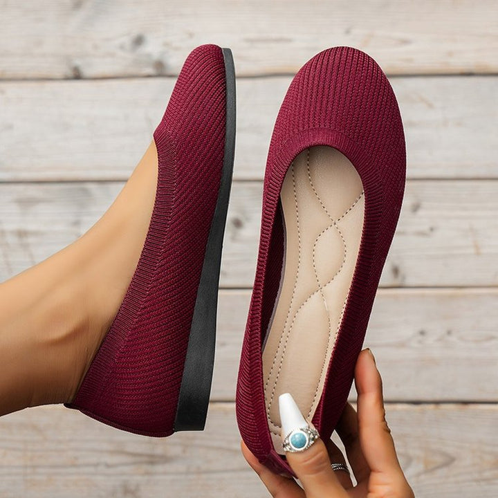 Chic women's orthopedic shoes, elegant ballerinas providing superior foot support and style.