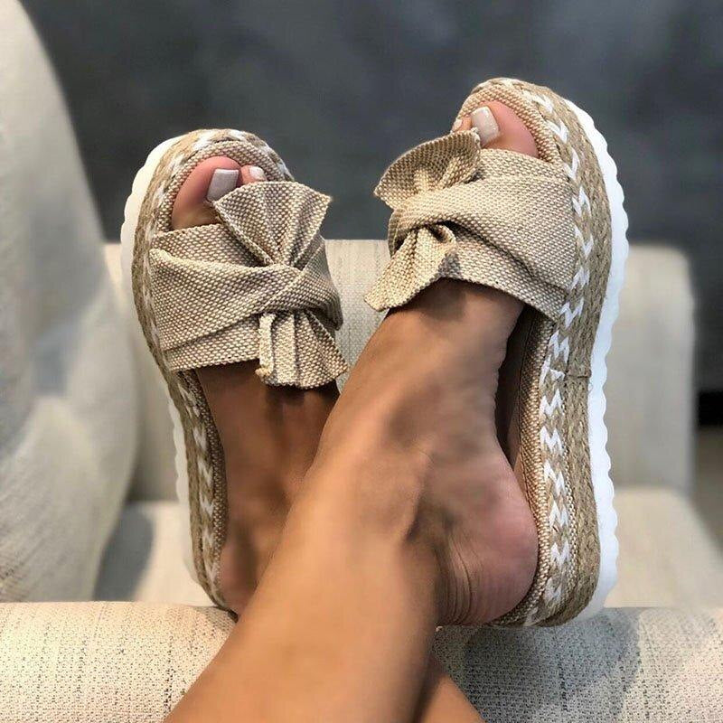 Women's orthopedic bow sandals. Stylish & comfortable slip-on summer footwear with arch support for all-day wear.