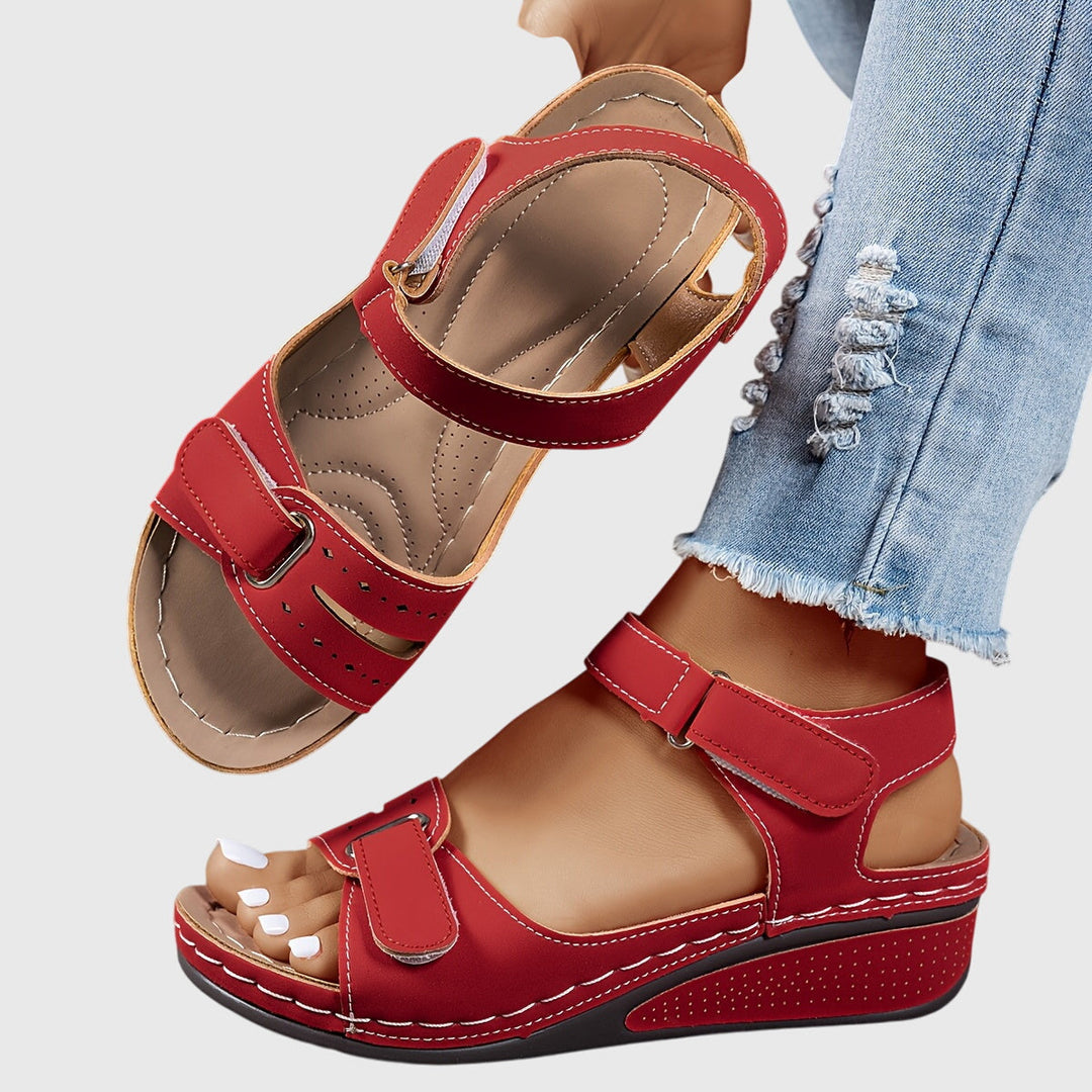 Women's orthopedic platform sandals with adjustable buckle strap, open toe comfort.