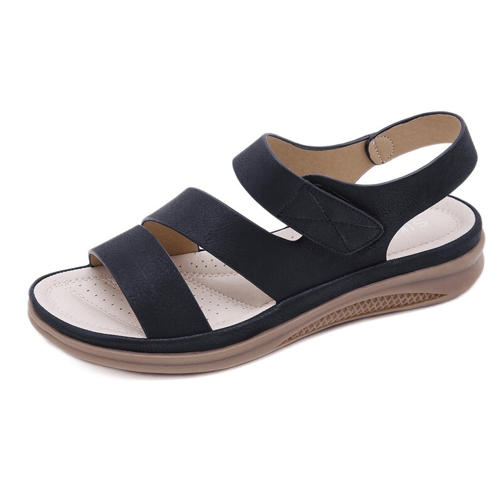 Durable sole of women's orthopedic wedge sandals, offering comfortable arch support for summer.