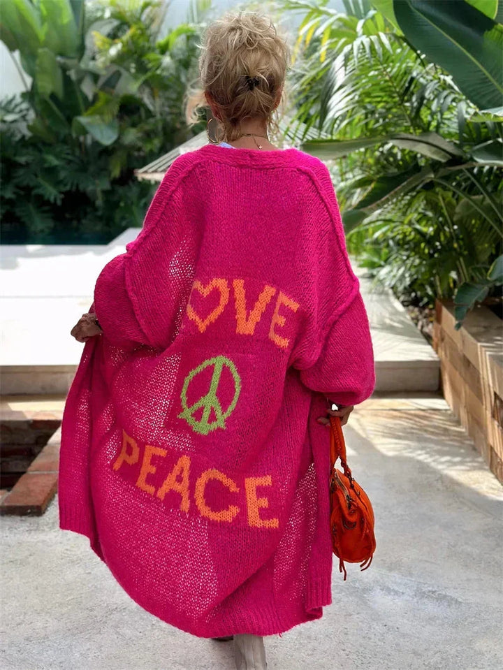 Vibrant bohemian women's knit cardigan. Oversized, longline, open front & relaxed for an effortless hippie look.