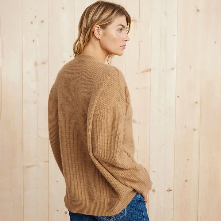 Soft long-sleeve V-neck cardigan, an essential oversized button-up for winter style.
