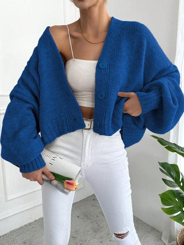 Women's oversized chunky knit cardigan in a wool blend, perfect for casual winter fashion layering.