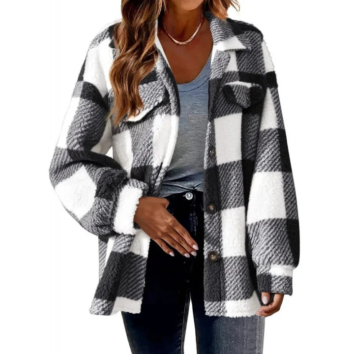 Comfortable women's oversized fleece plaid shacket, perfect for everyday casual style.