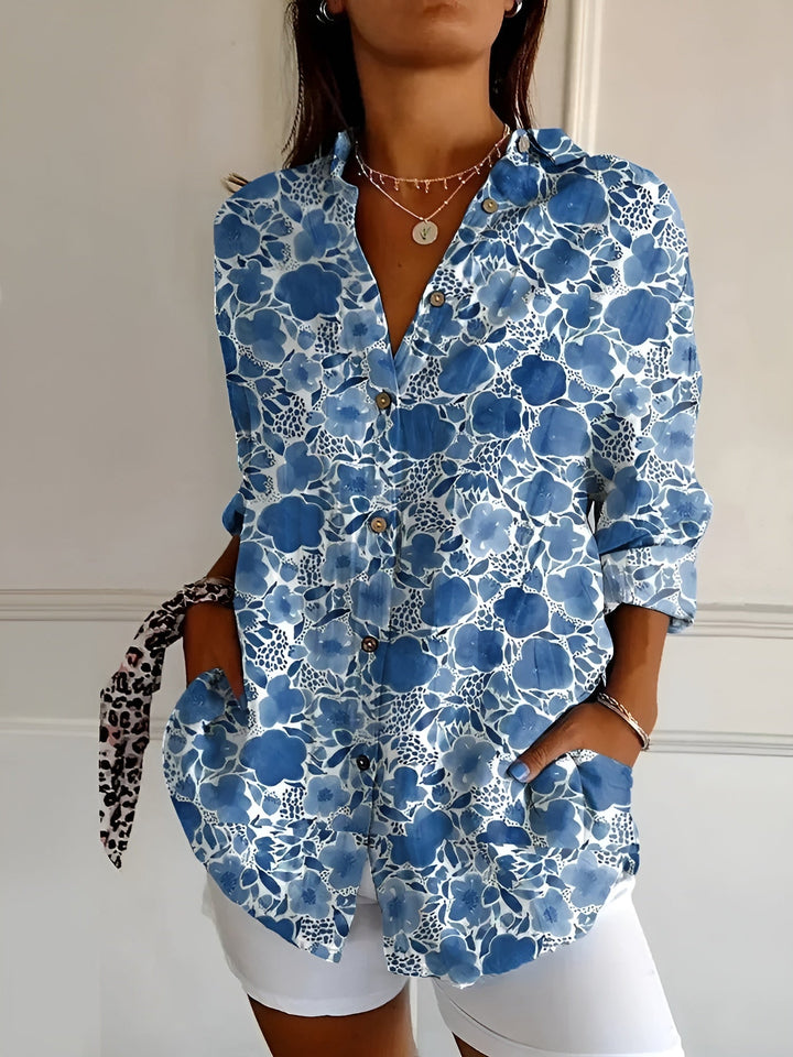 Women's oversized floral vine print button down blouse. Casual long sleeve top for spring and summer fashion.