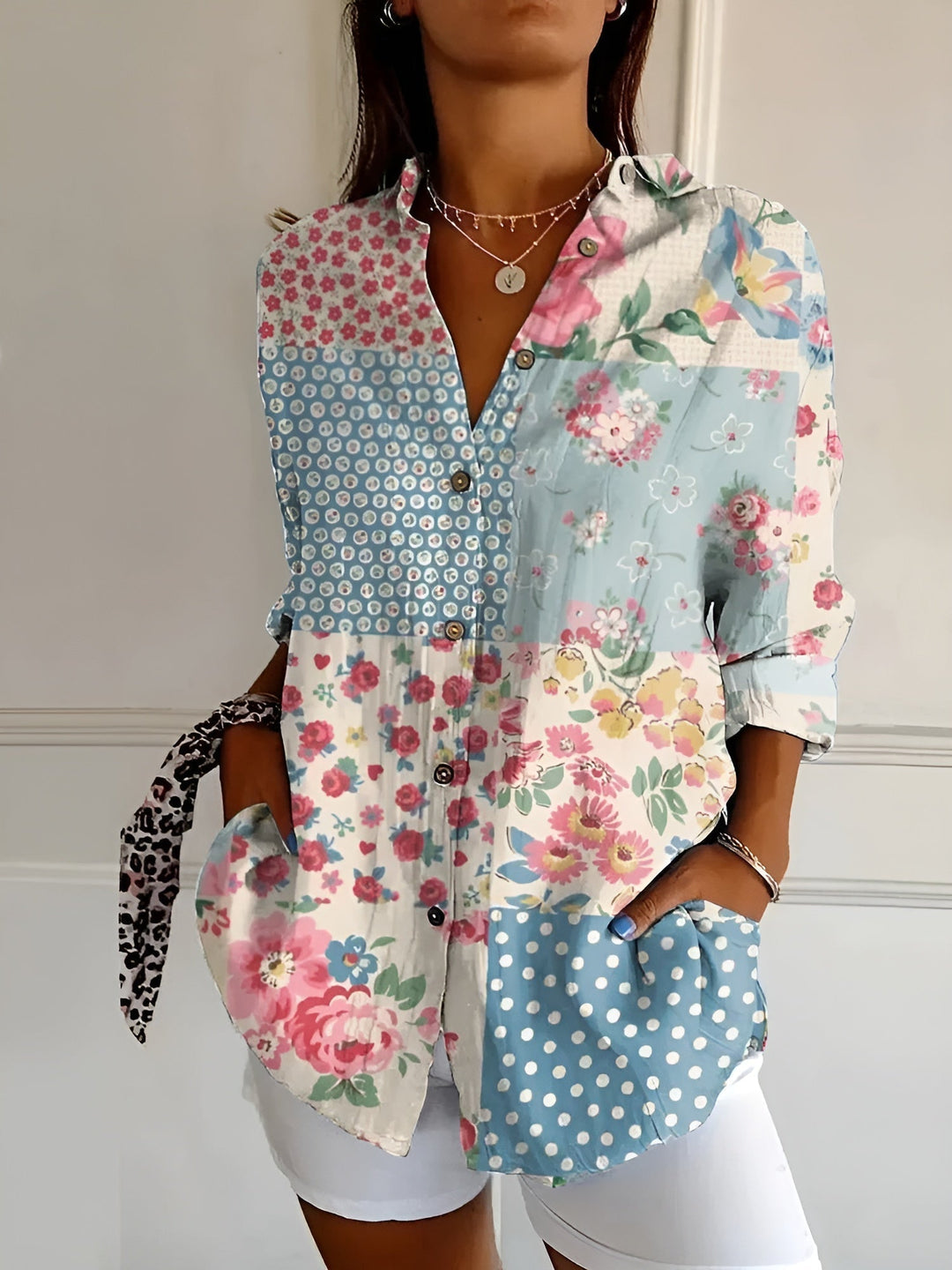 Stylish women's long sleeve floral vine print button down blouse. Casual oversized top for spring fashion.