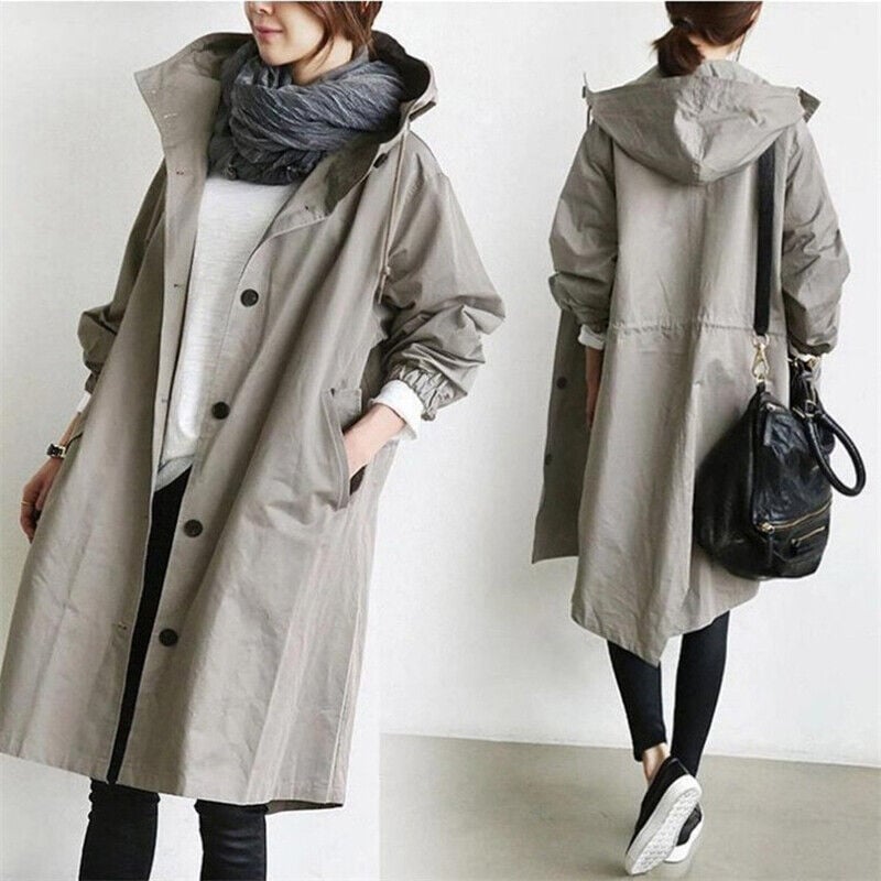 Women's oversized rain parka trench, shown in detail. Perfect water-resistant, lightweight outerwear.