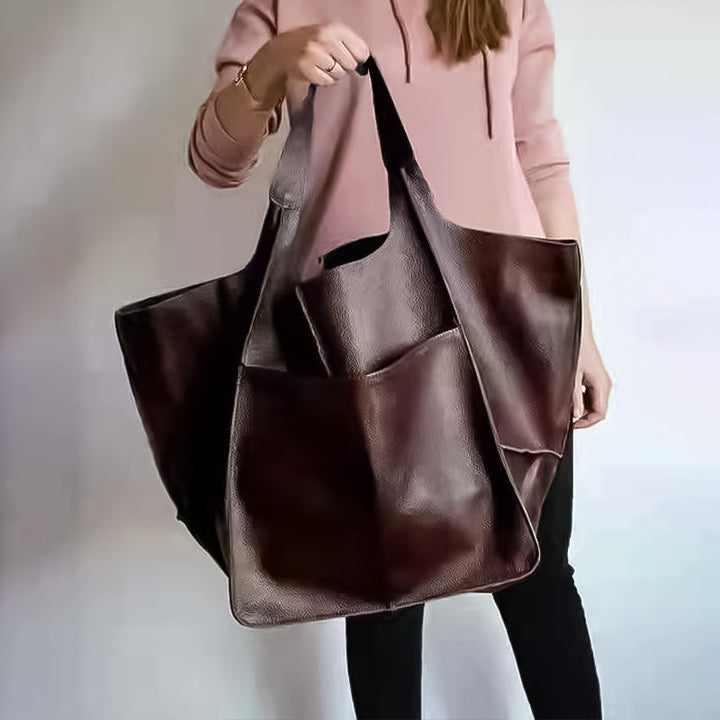 Women's oversized vintage leather shoulder bag, a stylish daily tote and fashion accessory.