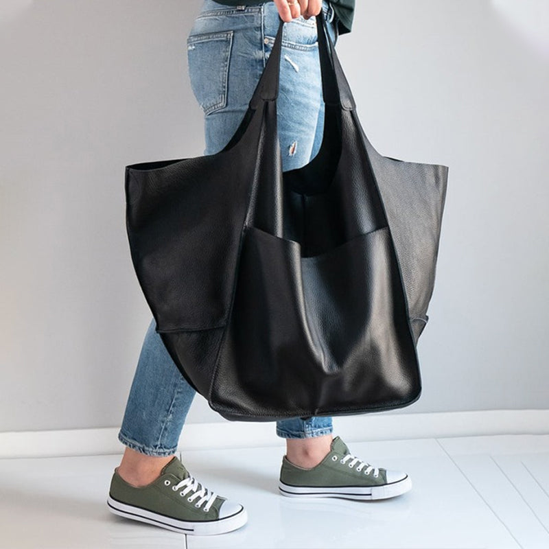 Oversized vintage leather shoulder bag for women, a chic travel bag and everyday accessory.