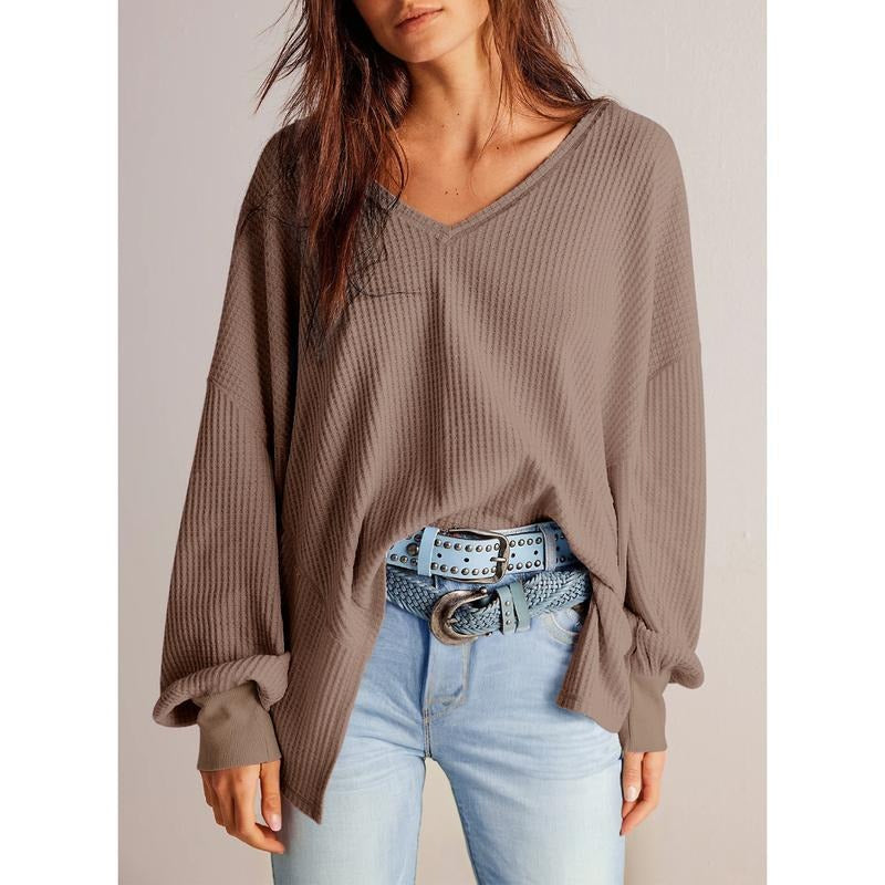 Stylish women's long-sleeve waffle knit pullover sweater, a versatile addition to any casual outfit